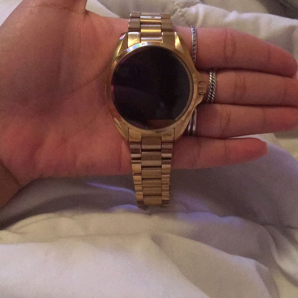 Michael Kors gold smart watch with charge